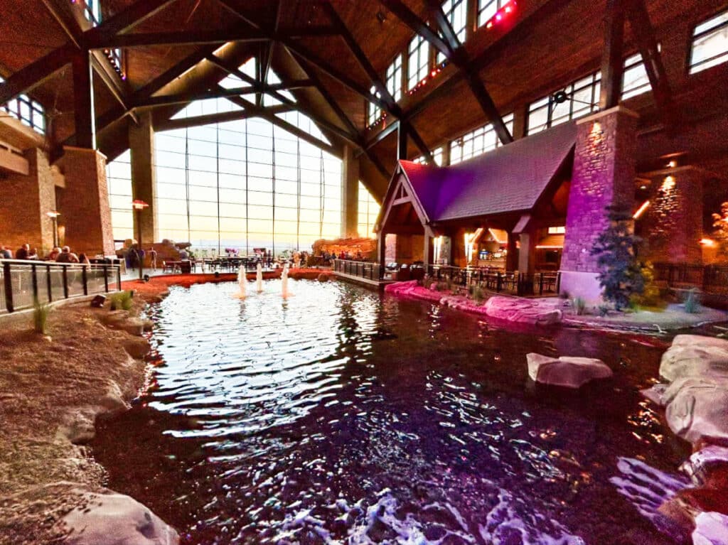 View of the manmade lagoon with fountain inside the Gaylord Rockies Resort & Convention Center