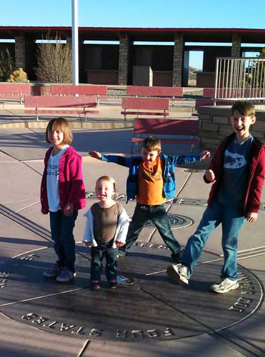 The author's kids in the Four Corners Monument