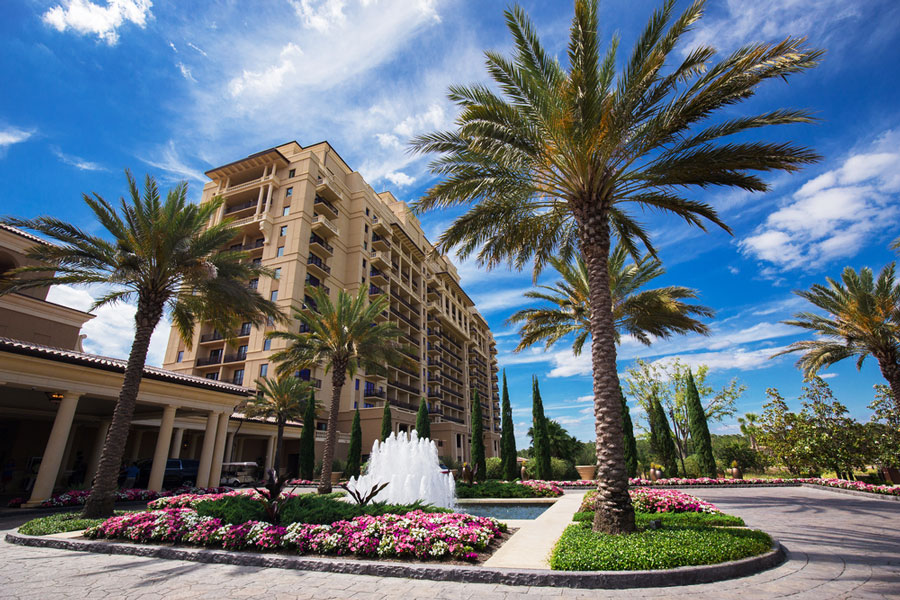 View of the Four Seasons Resort from the outside and some palm trees around it