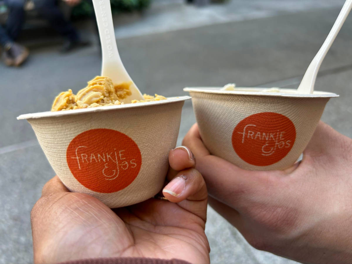 Holding bowls of Frankie and Jo’s ice cream
