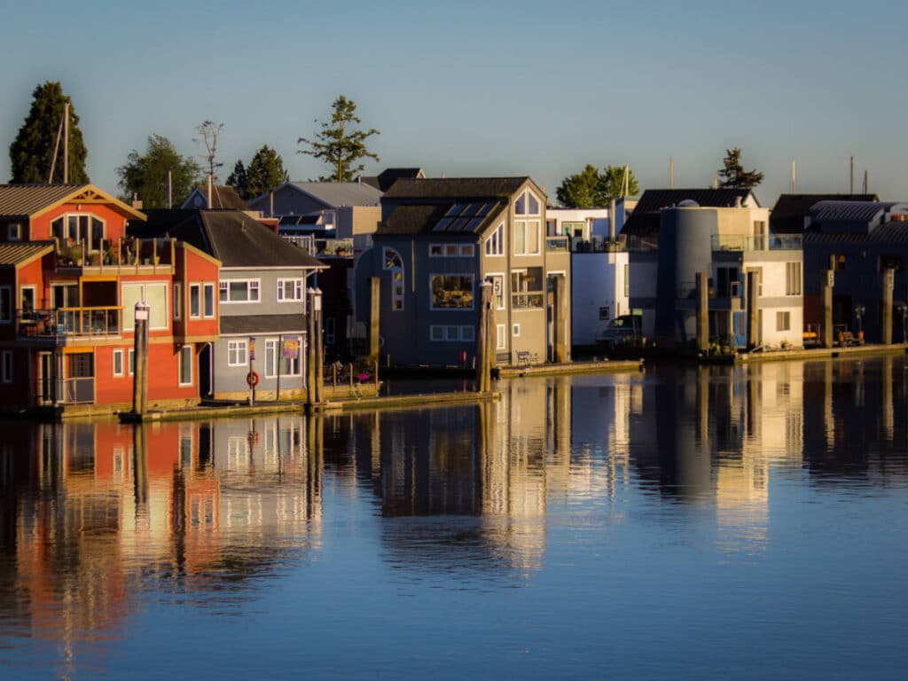 Colorful houses and its reflection on the Fraser River