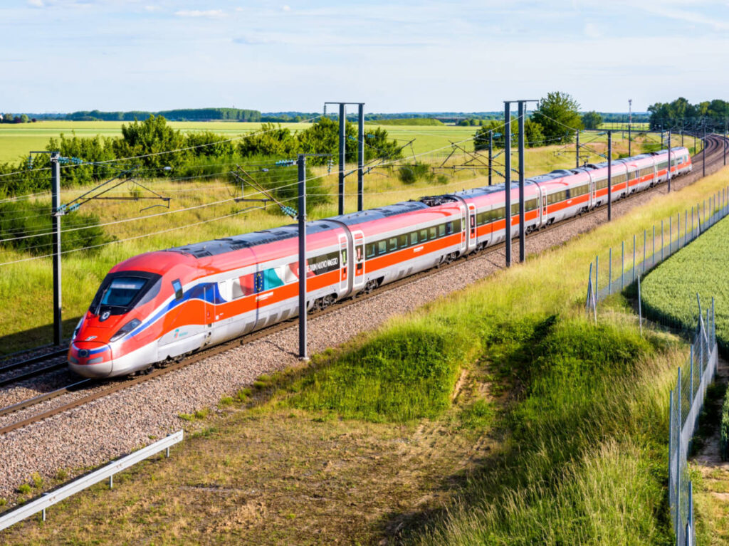Aerial view of the Frecciarossa high-speed train on the railway