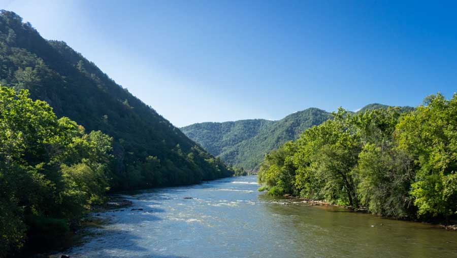 Clear blue sky over the French Broad River