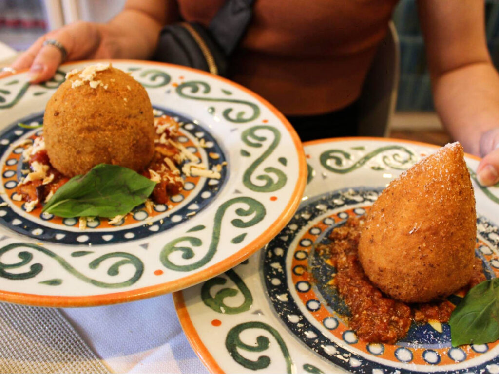View of the fresh Arancini on the colorful plates
