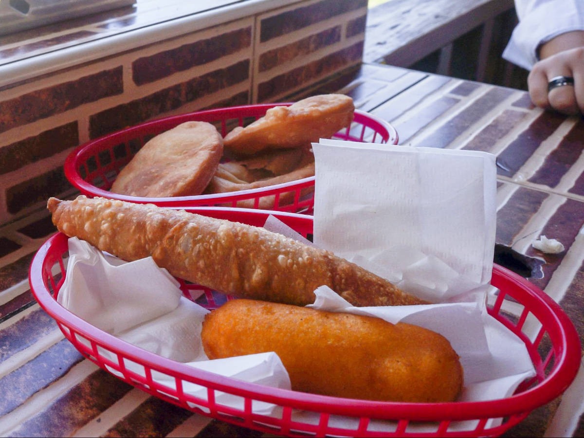 Fritters on a plate in a kiosk in Piñones