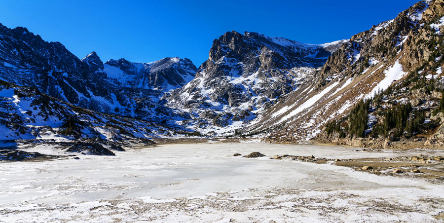 View of the frozen Brainard lake in the wilderness