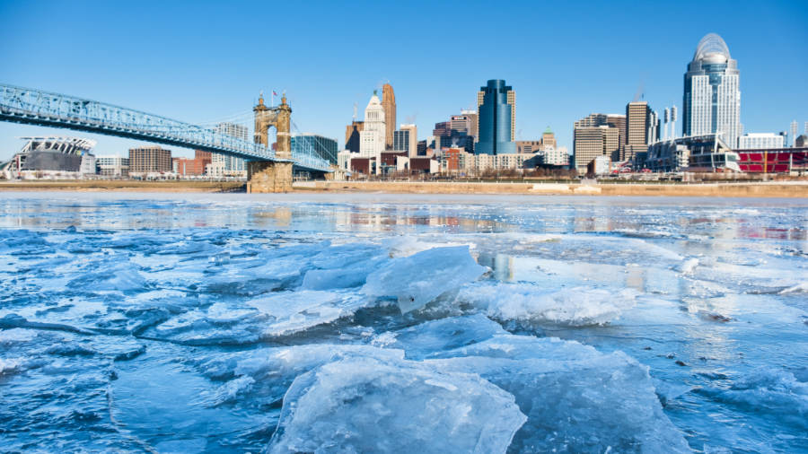 View of the icy Ohio River, Roebling Bridge, and Cincinnati's Skyline