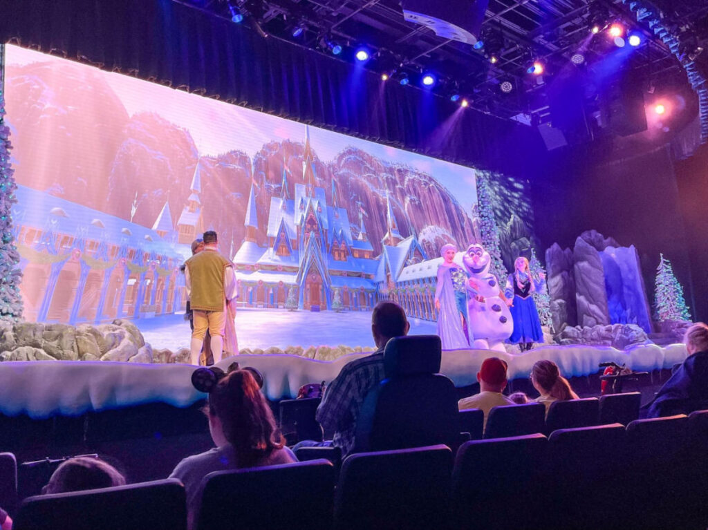 Frozen characters singing on stage