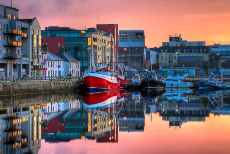 Boats docked in the bay in Galway