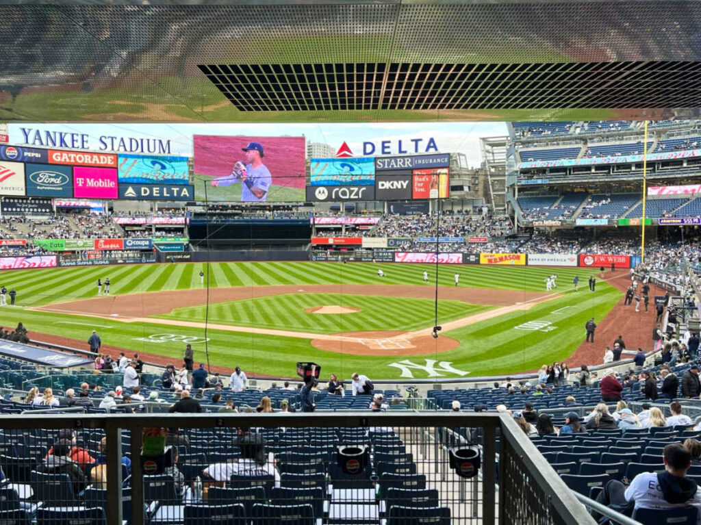 A baseball game view from the bleachers at the Yankee Stadium