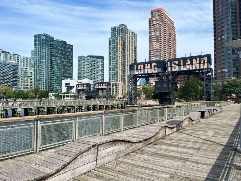 View of the Long Island arch signage at the boardwalk in Gantry Plaza State Park