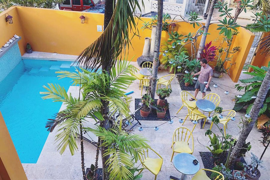 View of the garden and the pool area in Casa de Amistad