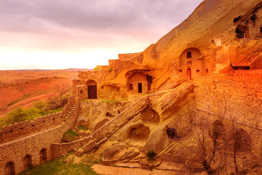 View of the Gareji Cave Monastery and the colorful sky