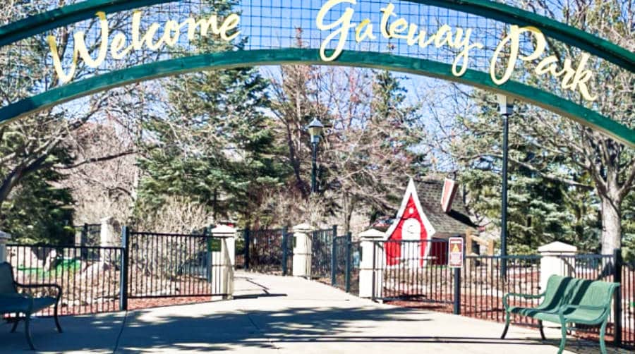 View of the entrance arch of Gateway Park Fun Center on a sunny day