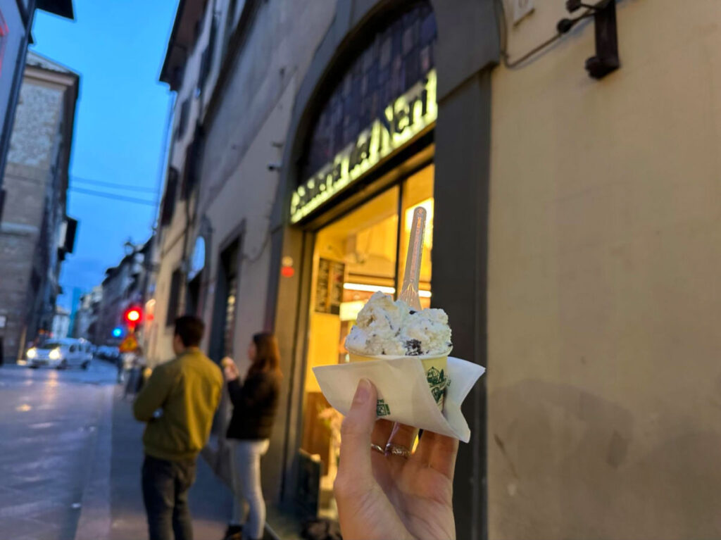 Holding a cup of tracciatella gelato in Gelateria dei Neri