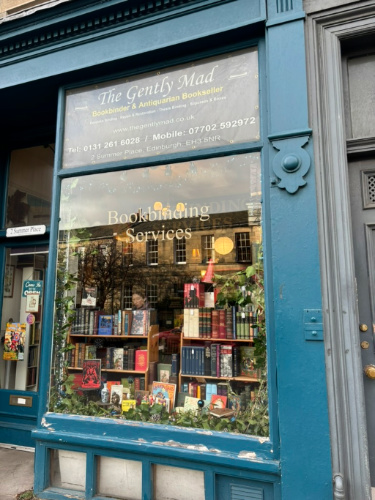 The huge front window of Gently Mad Bookstore