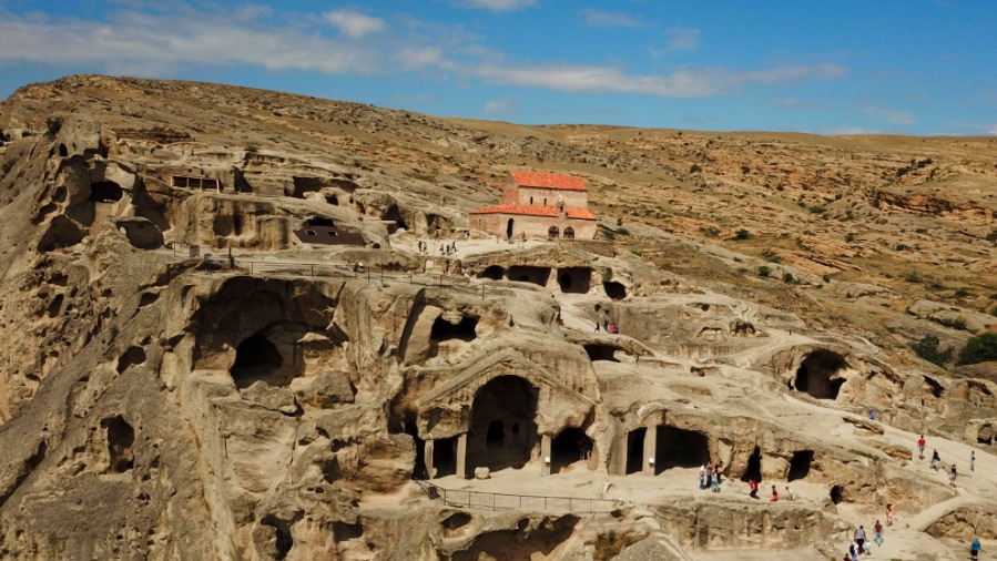 Aerial view of tourists going to The Uplistsikhe caves