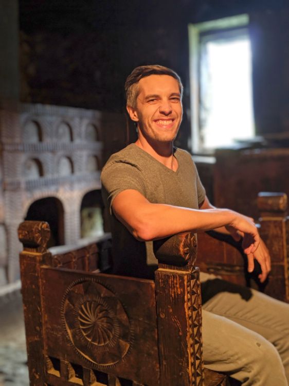 The author Nate Hake in a traditional Svan chair