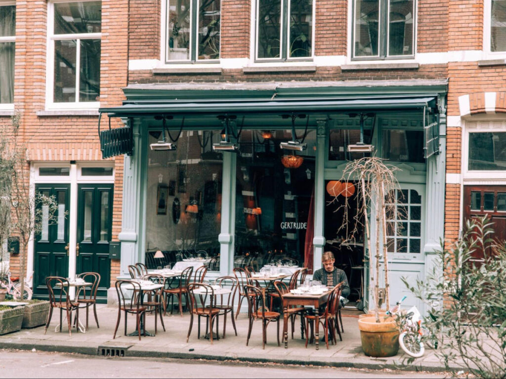 A man dining outside the Gertrude restaurant