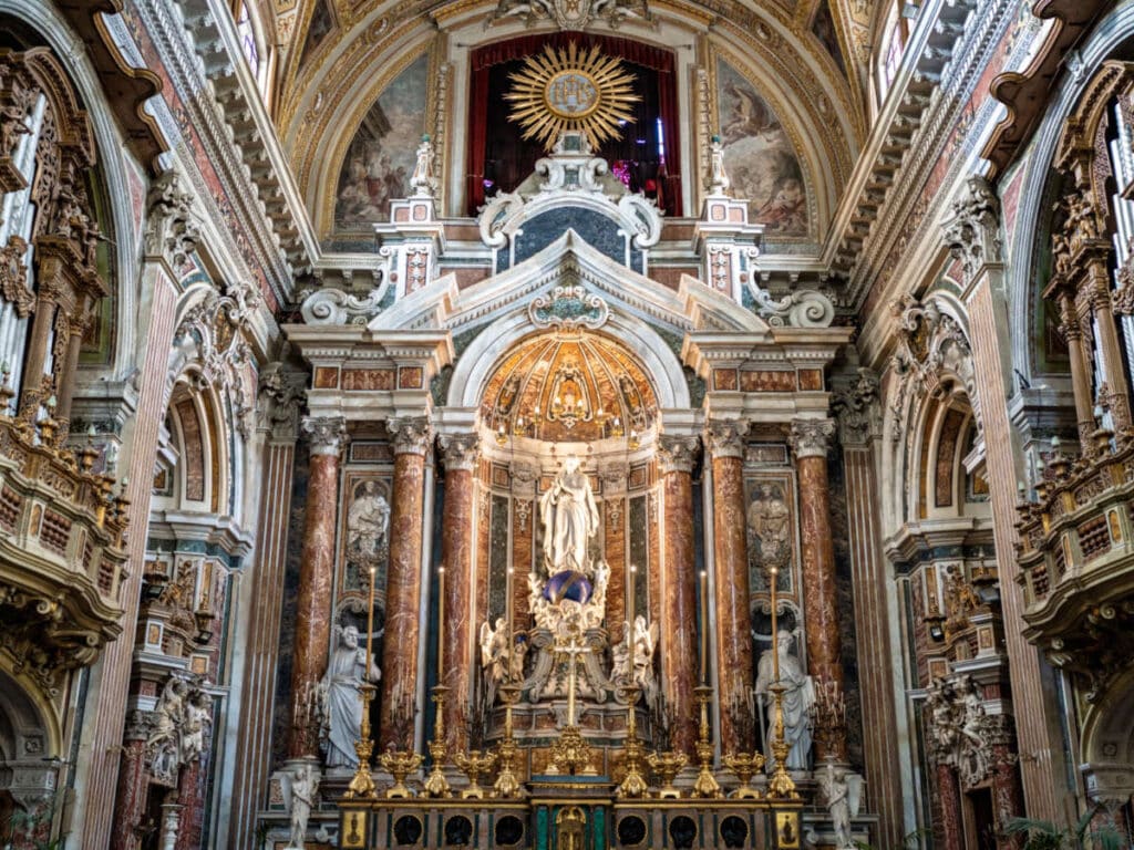 View of the magnificent altar and interior of the Gesu Nuovo Church