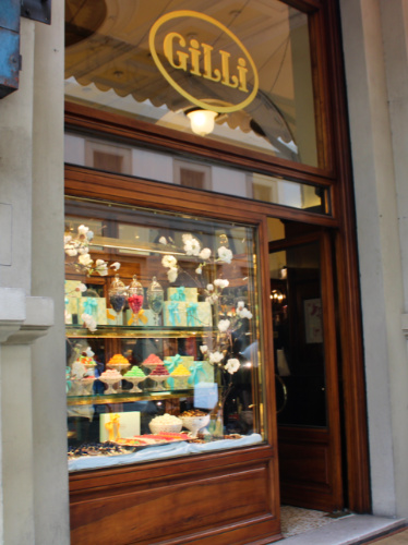 View of the cake display from the outside of Gilli Cafe