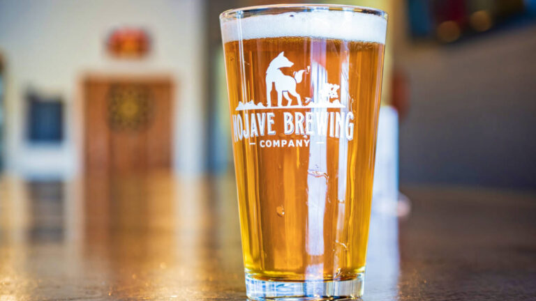 Closeup look of a glass of beer from Mojave Brewing Company