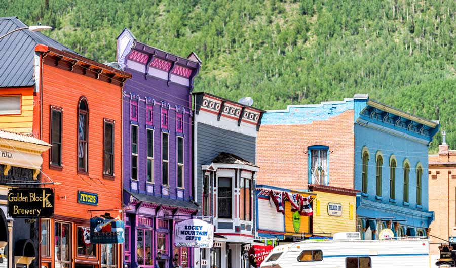 View of the Golden Block Brewery sign and the colorful shops in Silverton