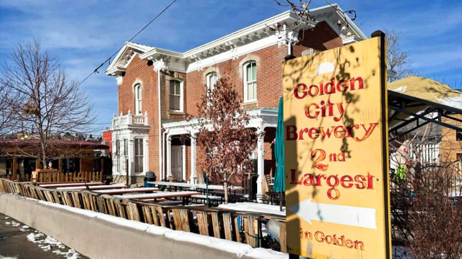 View of a yellow signage of Golden City Brewery outside a building