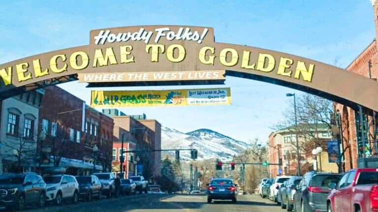 View of the street and welcome arch sign of Golden