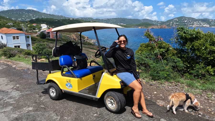 The author's wife on a golf cart