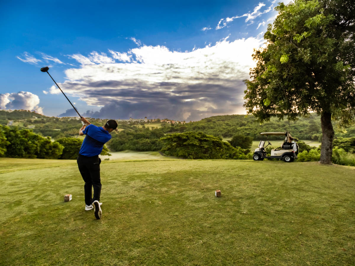 A man golfing at the El Conquistador Resort