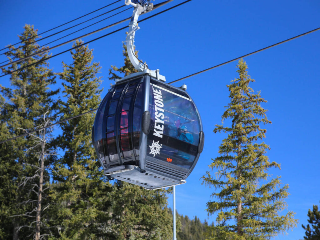 Clear blue sky over a gondola car in Keystone Resort