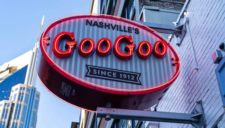 A neon sign of Nashville's Goo Goo outside the store