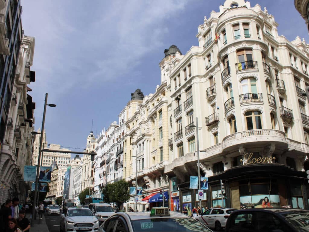 View of buildings and cars at the Gran Via shopping street