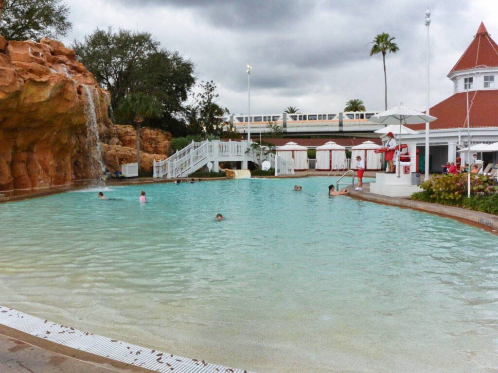 People enjoying their day on a pool in Grand Floridian