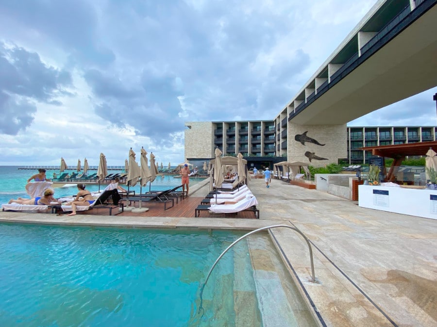 View of the the people wearing swimwear at the pool in Grand Hyatt