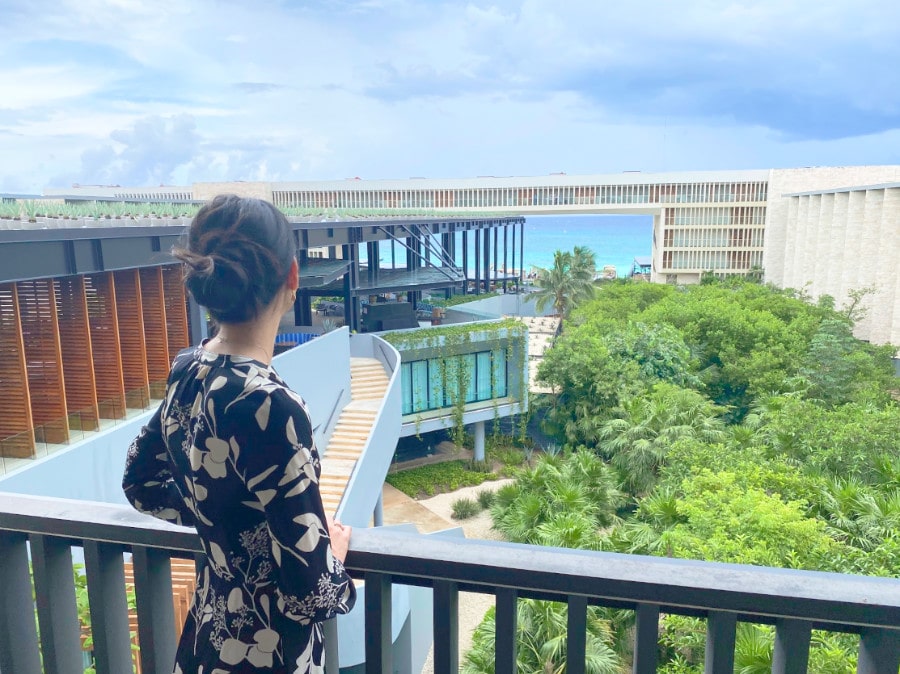 Clara admiring the view from the Grand Hyatt VIP balcony