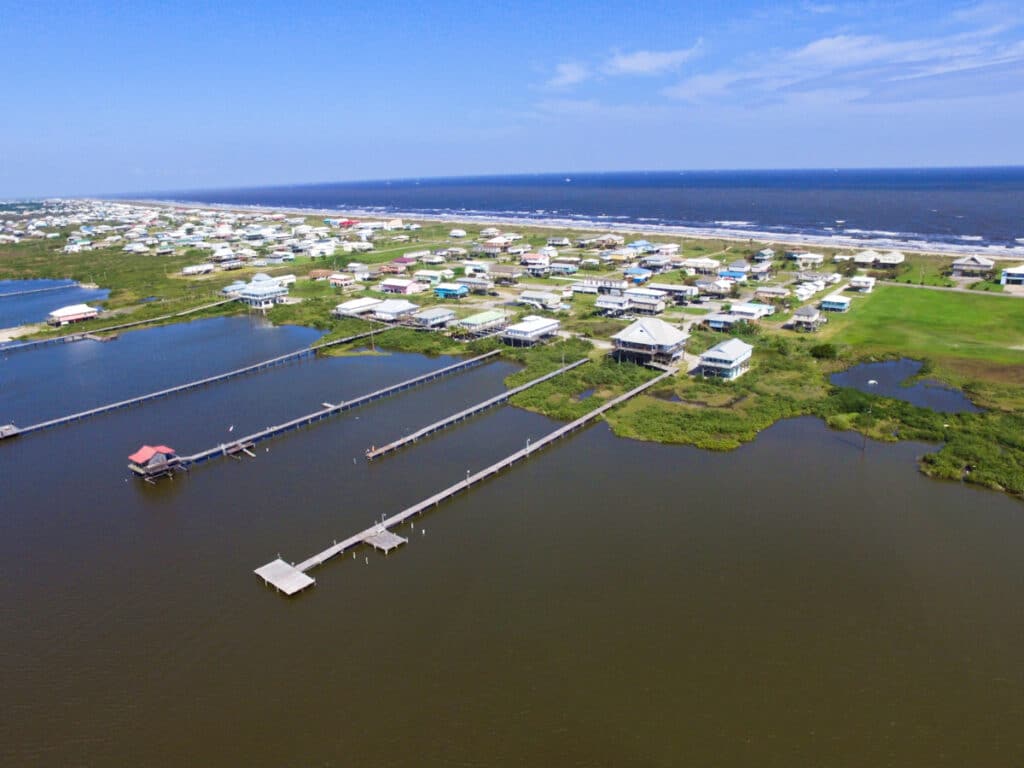 Aerial view of the houses and long boardwalks on Grand Isle