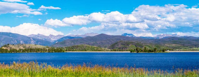 A serene view of Grand Lake, and the mountains