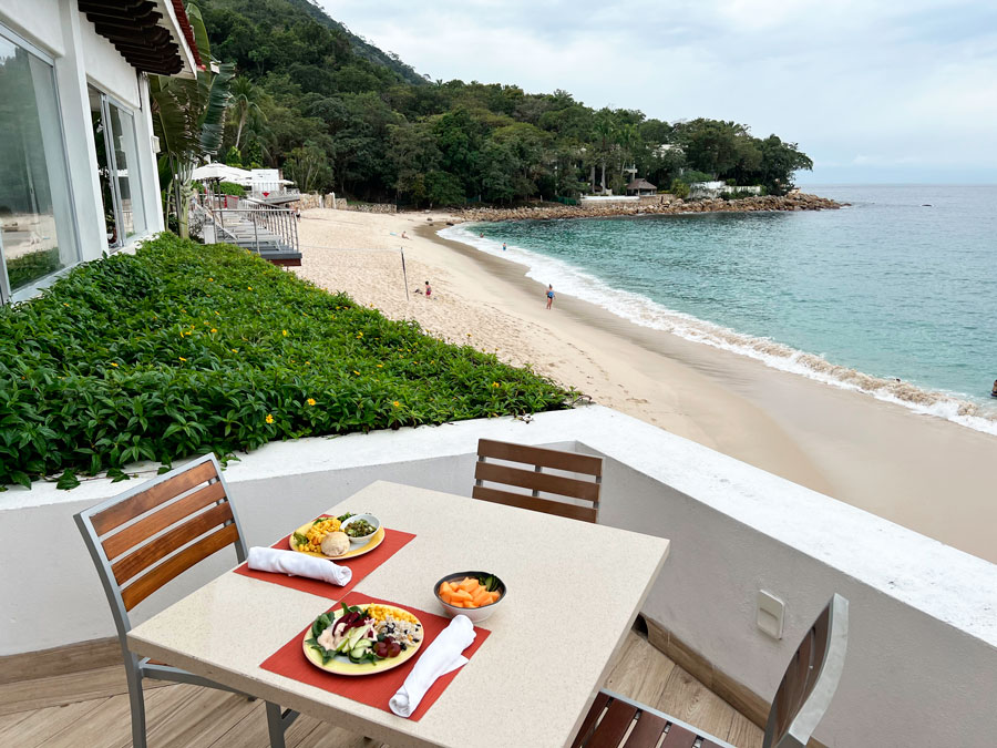 View of a meal on a table with the ocean view in Grand Park Royal
