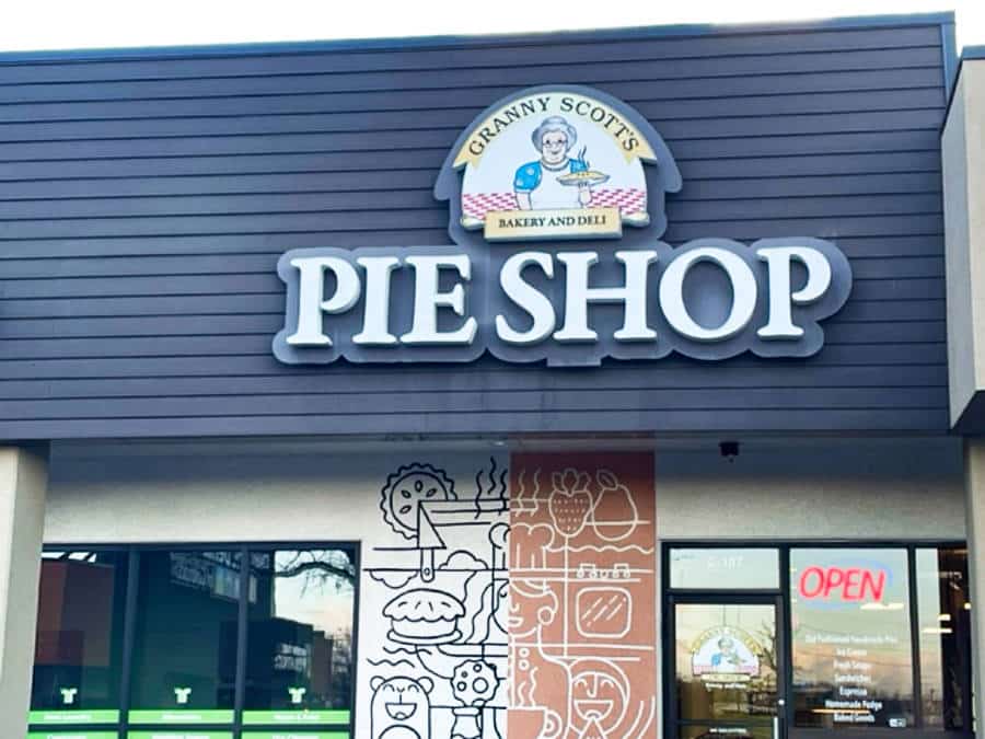 View of the huge signage and graffiti outside Granny Scott's Pie Shop