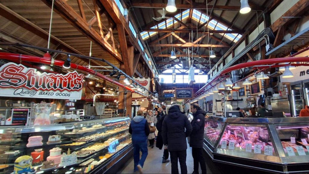 View inside the Granville Island Public Market with people shopping