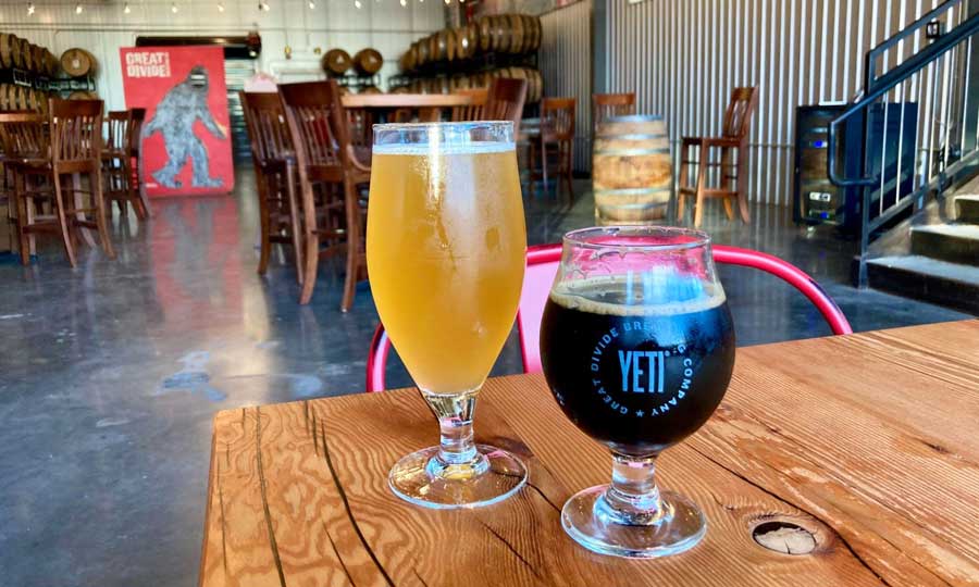 Glasses of beer on a table inside the Great Divide Brewing Company