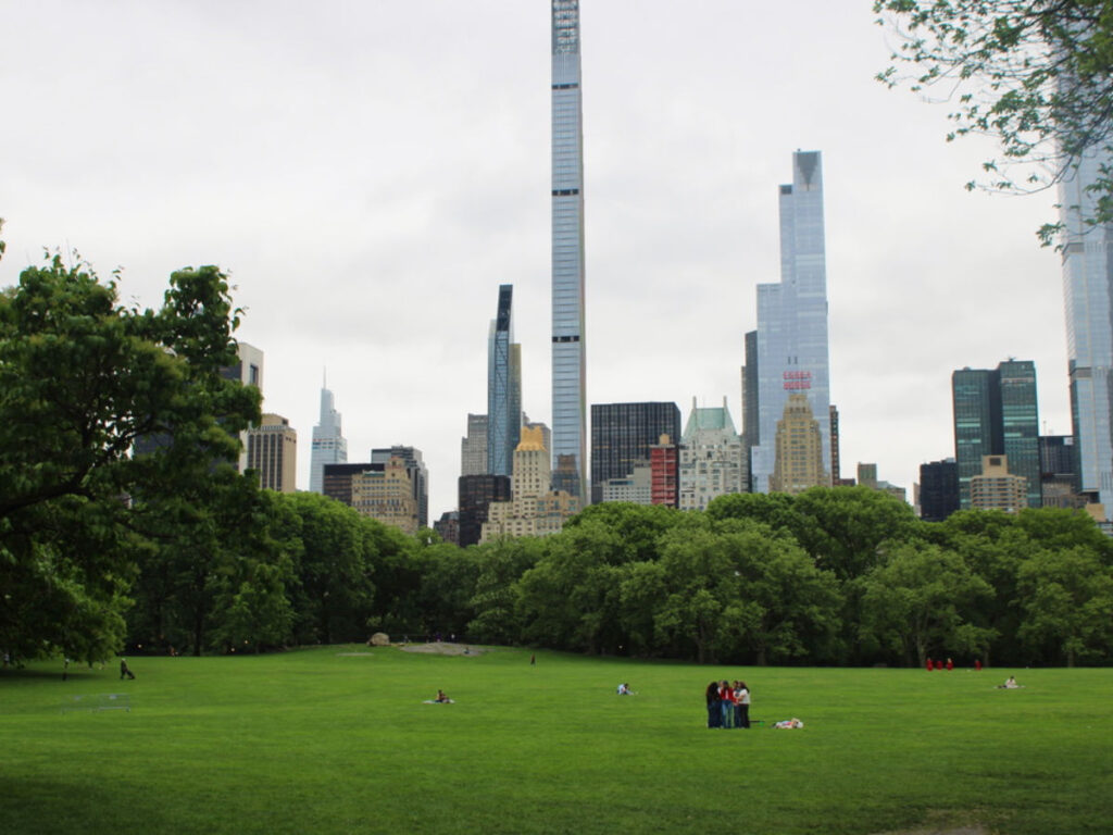 People hanging out on the Great Lawn of Central Park
