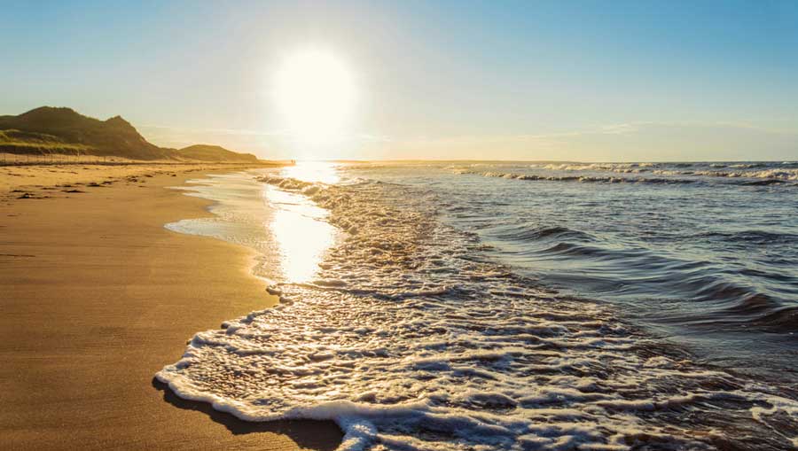 View of the sunrise above the Greenwich Beach