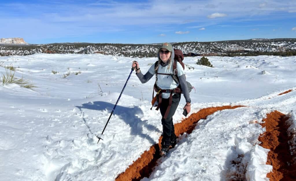 The author's friend, Skycie smiling for a photo while hiking