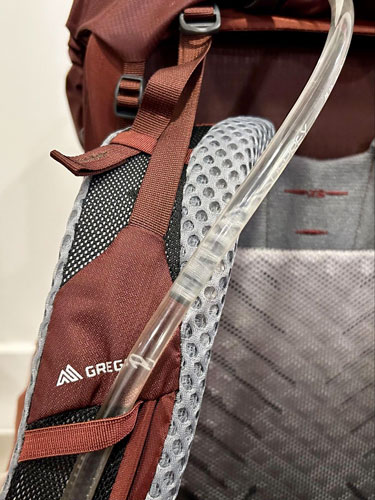 Close up view of the reservoir hose of the Gregory Maven backpack