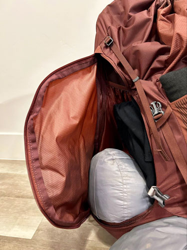 Close up view of the side access of the Gregory Maven backpack