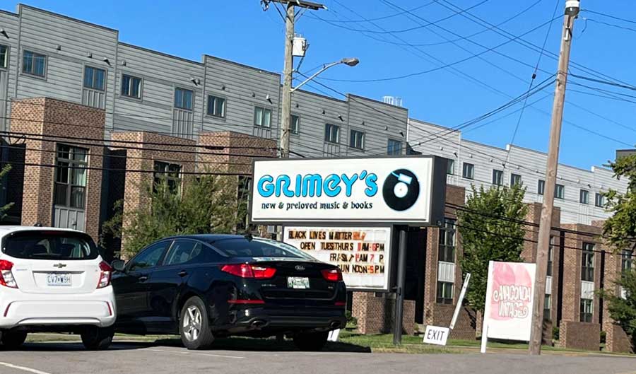 View of the Grimey's New & Preloved Music signage on the outside