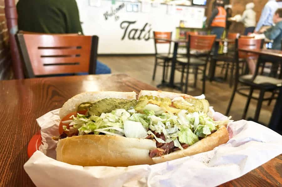 A big serving of grinder sandwich in Tat’s Delicatessen